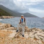 An elderly man on Mljet with a sea view